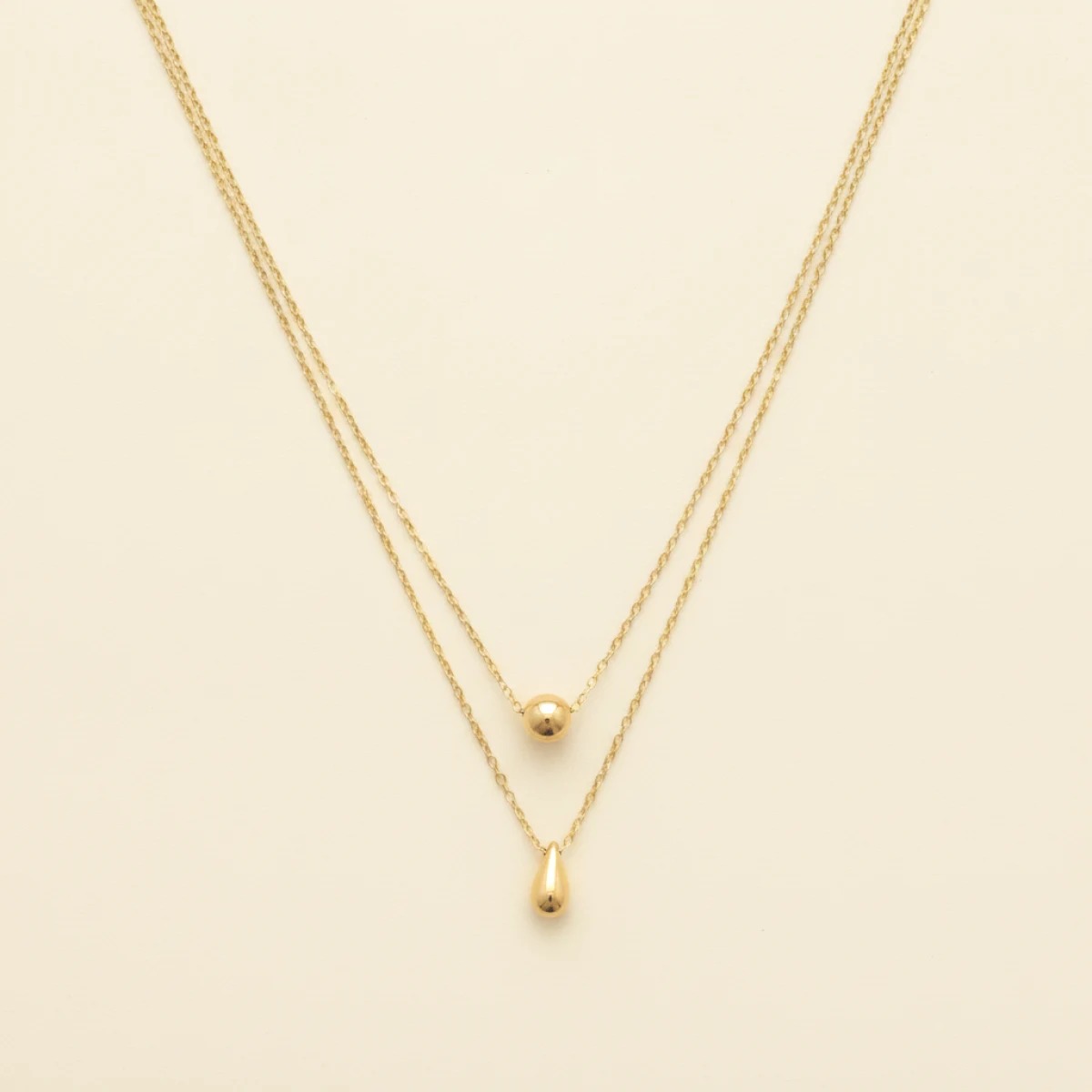 Dubbele ketting met druppel hangers – goudkleurig