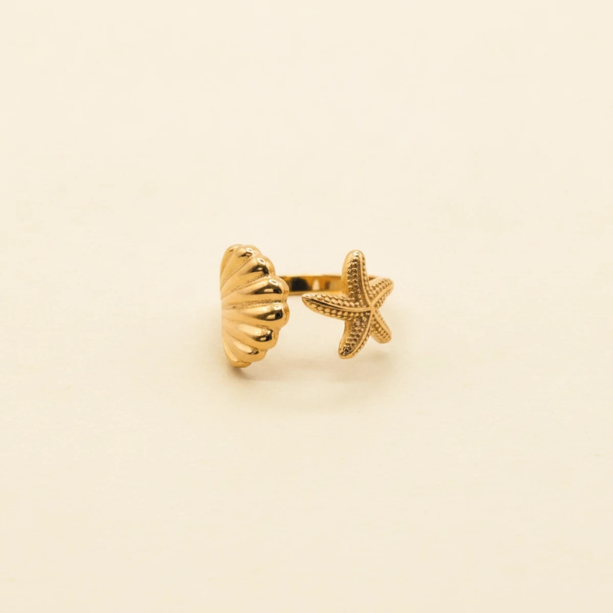 Ring met schelp en ster