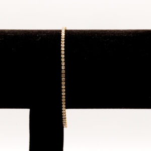 Steentjes armbandje - goudkleurig