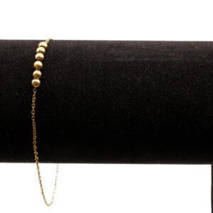 Goudkleurig enkelbandje met bolletjes