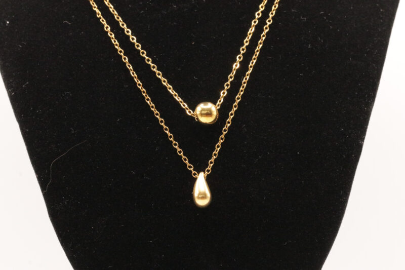 Dubbele ketting met druppel hangers - goudkleurig