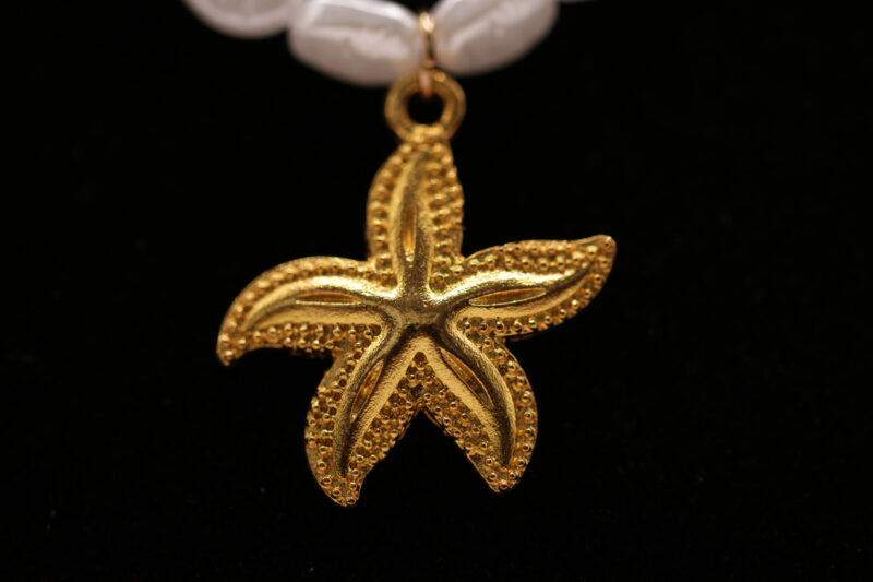 Beach parel ketting - parel goudkleurig